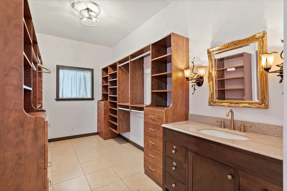 Bathroom vanity and walk in closet area