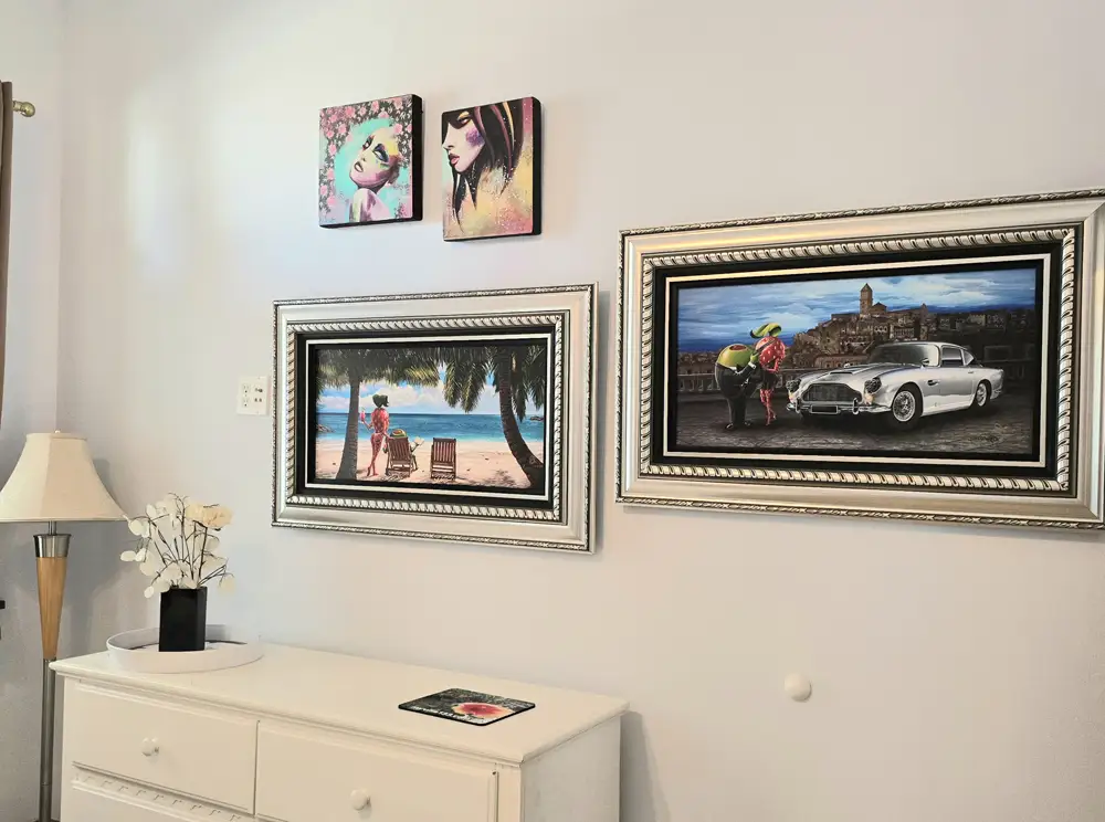 Artwork hanging in "The Salon"