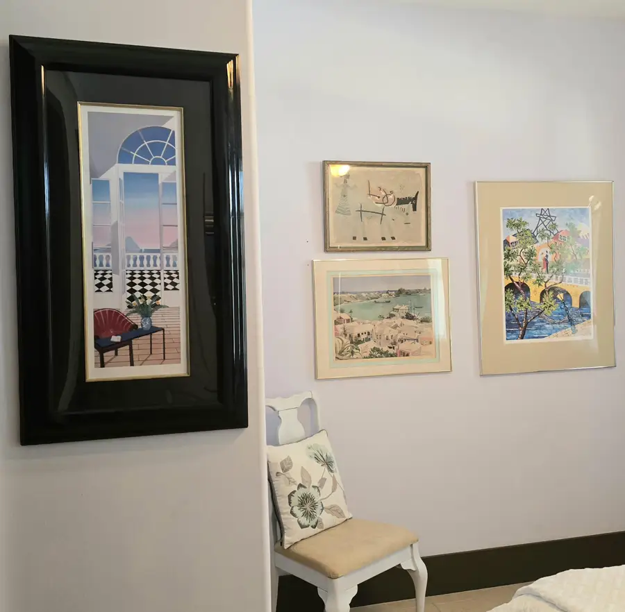 "The Salon" artwork and chair.